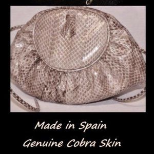 This Spanish Cobra WokeUp2Find He WasA Vintage Bag